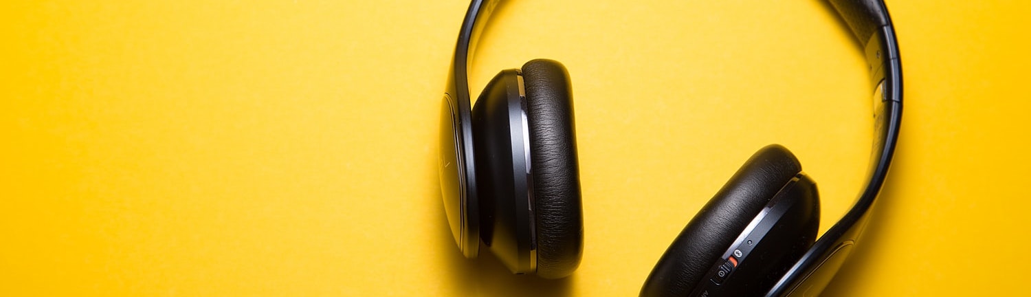 Headphones on a yellow background