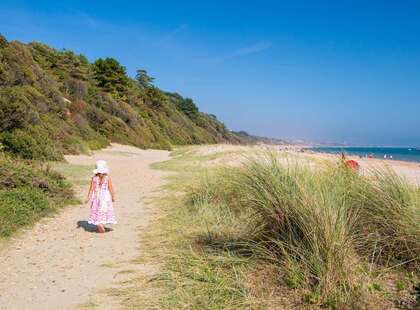 A child on the beach on holiday